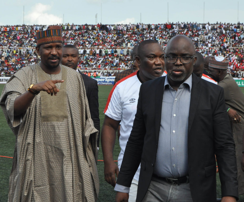 LMC boss, Shehu Dikko and NFF President, Amaju Pinnick during a match in Enugu
